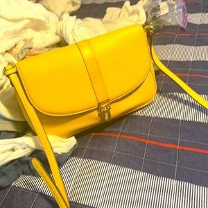 Mk purse new with small stain